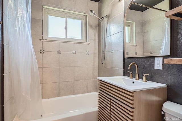 2310 Kenton St, Aurora, CO 80010 - full bathroom with shower / tub combo, healthy amount of natural light, and vanity