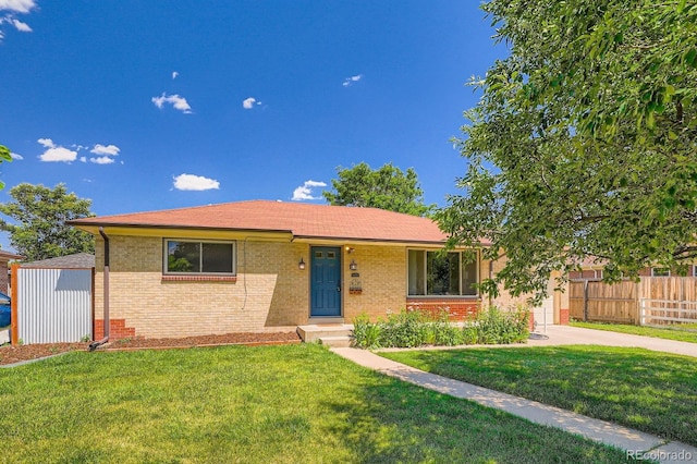 2310 Kenton St, Aurora, CO 80010 - single story home featuring brick siding, driveway, a garage, and a shingled roof