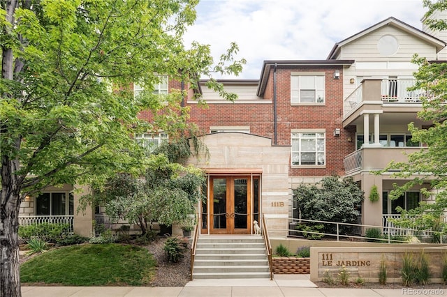 111 S Monroe St Unit B106, Denver, CO 80209 - view of front of house with french doors and brick siding