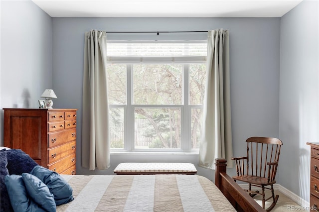 111 S Monroe St Unit B106, Denver, CO 80209 - bedroom with multiple windows and carpet floors