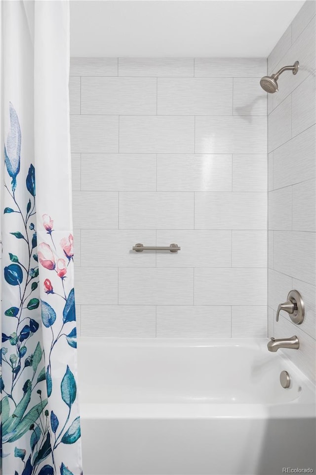 111 S Monroe St Unit B106, Denver, CO 80209 - bathroom with shower / bath combination with curtain