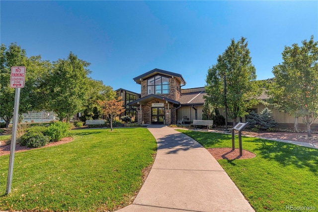 view of front of property with a front lawn