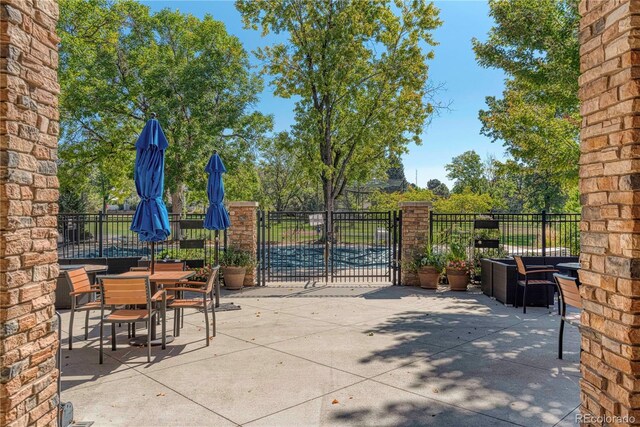 13609 E Cornell Ave Unit 107, Aurora, CO 80014 - view of patio with fence