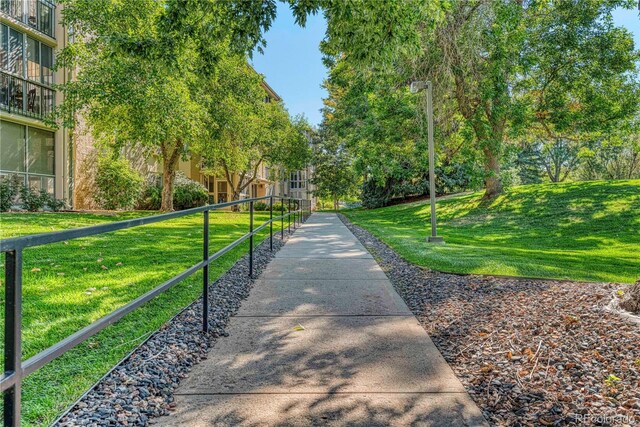 13609 E Cornell Ave Unit 107, Aurora, CO 80014 - surrounding community featuring a lawn