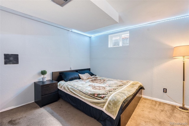 bedroom with light colored carpet