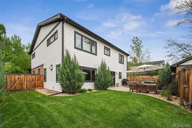 2480 Quitman St, Denver, CO 80212 - back of property with a patio area