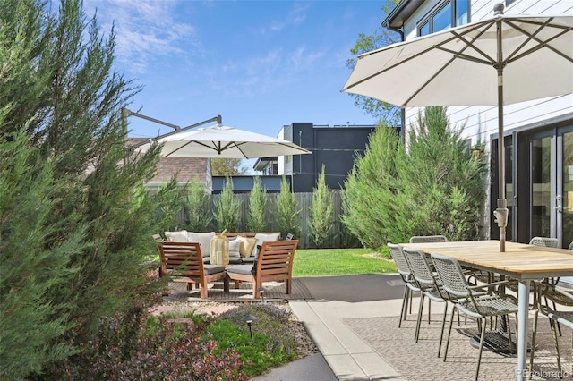 2480 Quitman St, Denver, CO 80212 - view of patio featuring fence, outdoor dining area, and outdoor lounge area
