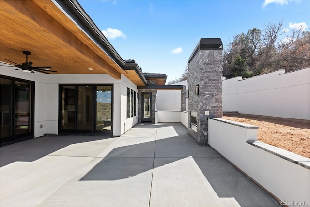 8103 Raphael Ln, Littleton, CO 80125 - view of patio / terrace featuring fence and ceiling fan