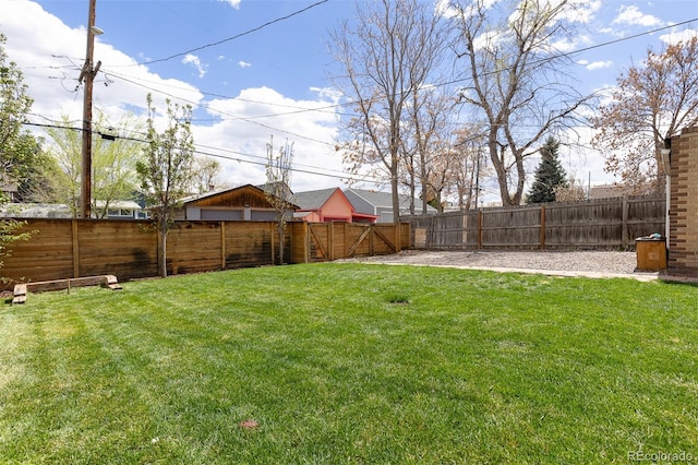 view of yard featuring a fenced backyard