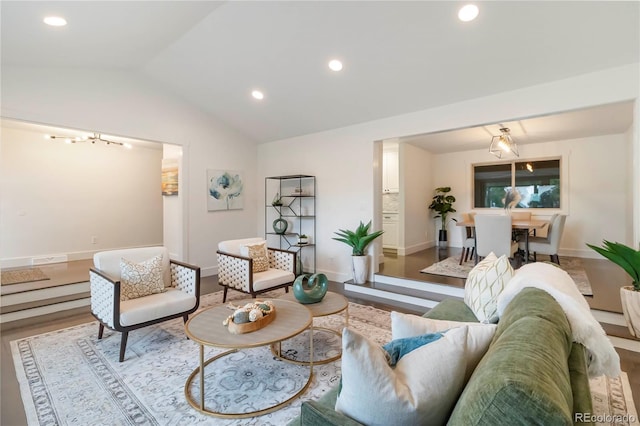 6581 E Heritage Pl, Englewood, CO 80111 - living area featuring vaulted ceiling, wood finished floors, recessed lighting, and a chandelier