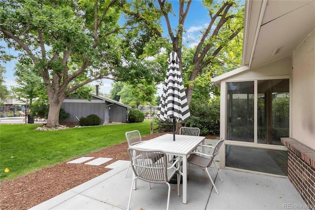 6581 E Heritage Pl, Englewood, CO 80111 - view of patio with outdoor dining space and a sunroom