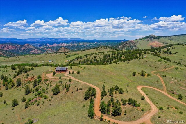 1434 N B St, Cripple Creek, CO 80813 - birds eye view of property with a mountain view and a rural view