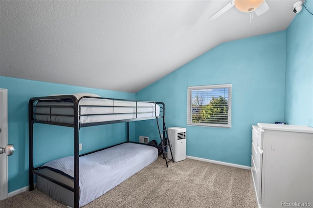 12961 Monaco Way, Thornton, CO 80602 - bedroom featuring lofted ceiling, carpet, and a ceiling fan