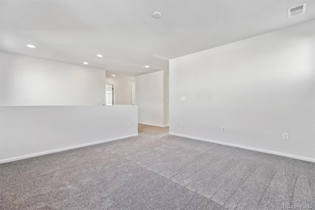 empty room with carpet flooring