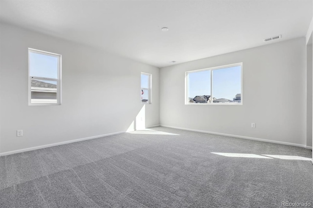 empty room featuring carpet flooring