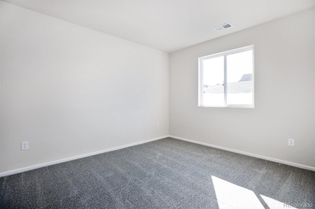 empty room featuring carpet flooring