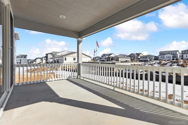 view of patio featuring a balcony