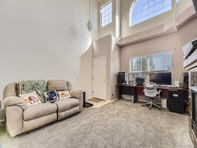 9832 Kenton Cir, Commerce City, CO 80022 - office space with carpet, a towering ceiling, and baseboards