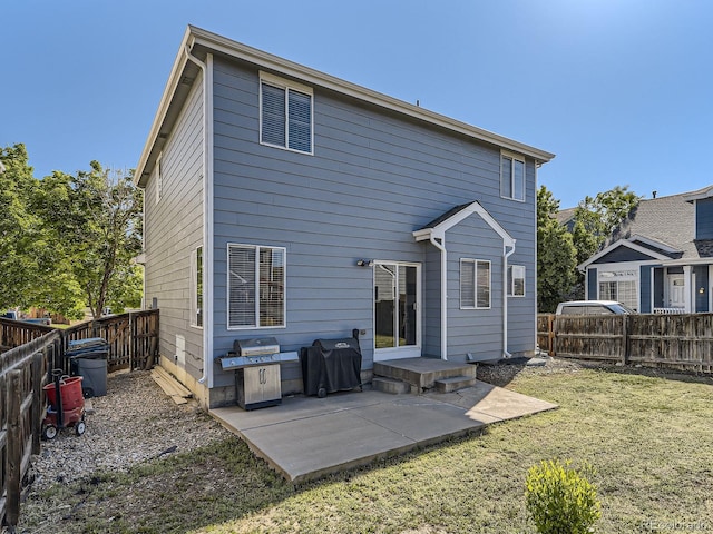 9832 Kenton Cir, Commerce City, CO 80022 - rear view of property featuring a patio