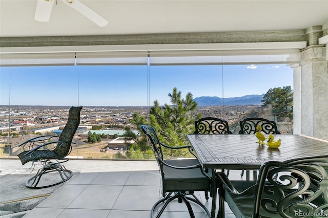 sunroom with a mountain view