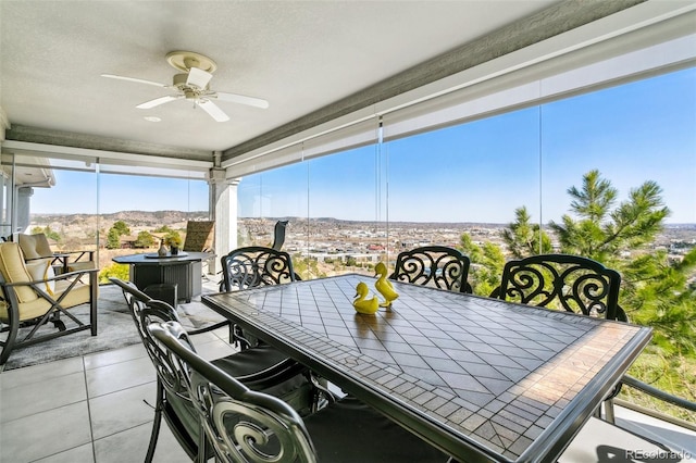 sunroom with a mountain view