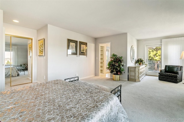 carpeted bedroom featuring access to exterior, recessed lighting, and baseboards