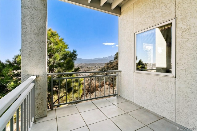 balcony featuring a mountain view