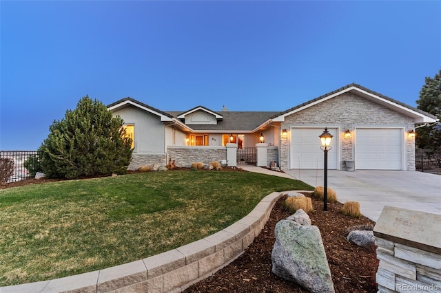 ranch-style house with an attached garage, fence, stone siding, and concrete driveway