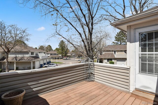 12622 E Warren Dr Unit E, Aurora, CO 80014 - wooden deck featuring a residential view