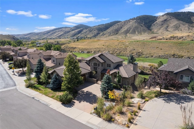 property view of mountains featuring a residential view