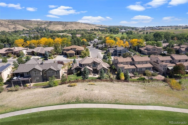 bird's eye view featuring a mountain view and a residential view