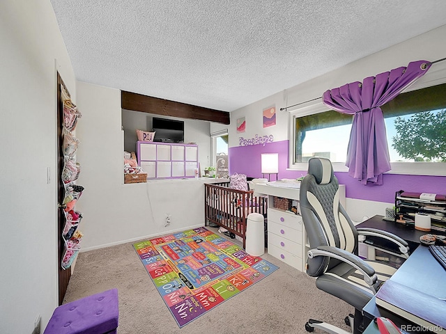 carpeted office with a textured ceiling