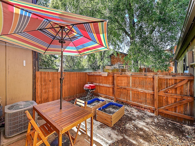 view of patio with central AC