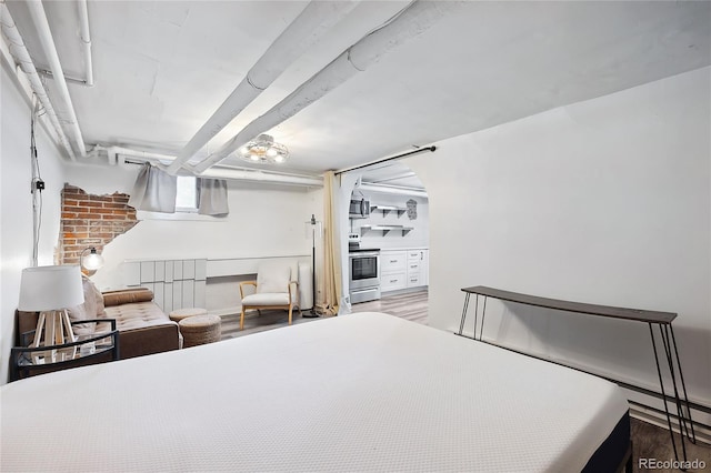 bedroom featuring wood-type flooring