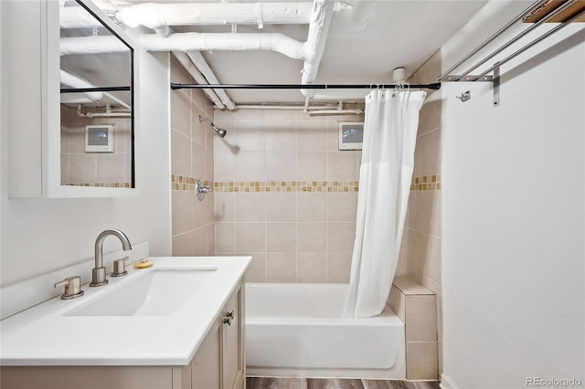 1331 N Ogden St Unit 1, Denver, CO 80218 - bathroom featuring shower / bath combo and vanity
