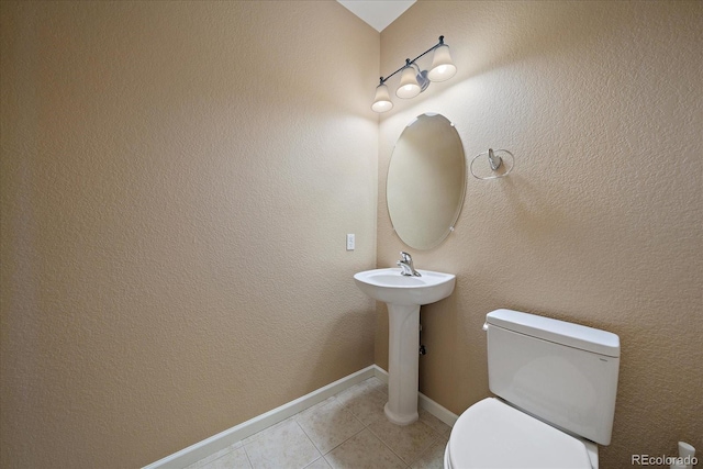 22873 E David Pl, Aurora, CO 80016 - half bath with tile patterned floors and toilet