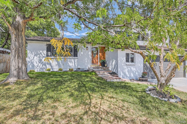 view of front of property with a front lawn