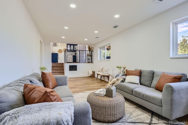 living room with light hardwood / wood-style flooring