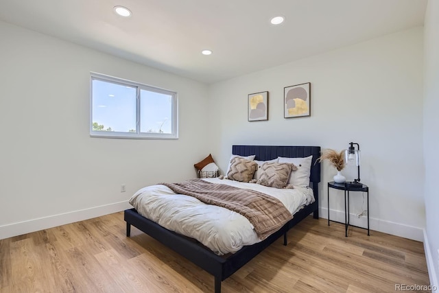 bedroom featuring light hardwood / wood-style floors