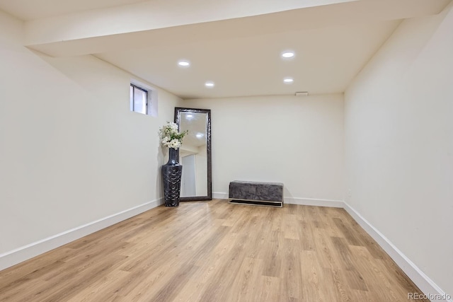 spare room featuring light wood-type flooring