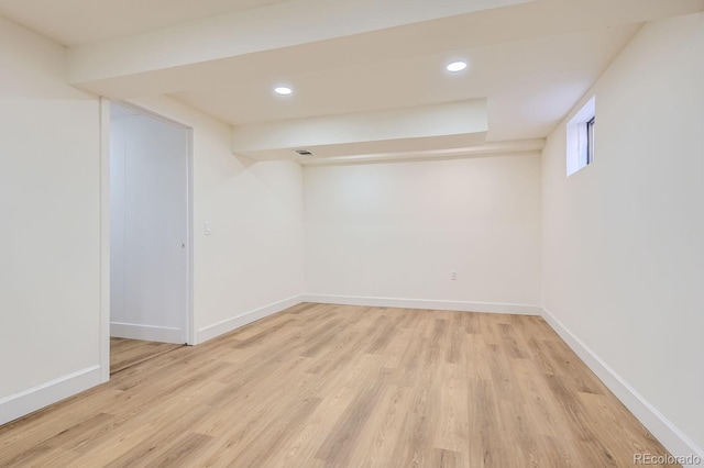 basement with light wood-type flooring