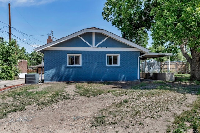 3151 N Elizabeth St, Denver, CO 80205 - rear view of house with a chimney