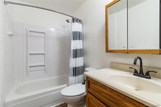 full bath featuring toilet, vanity, and shower / bath combination with curtain