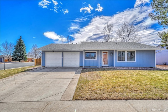 ranch-style home featuring a garage, driveway, a shingled roof, and a front yard