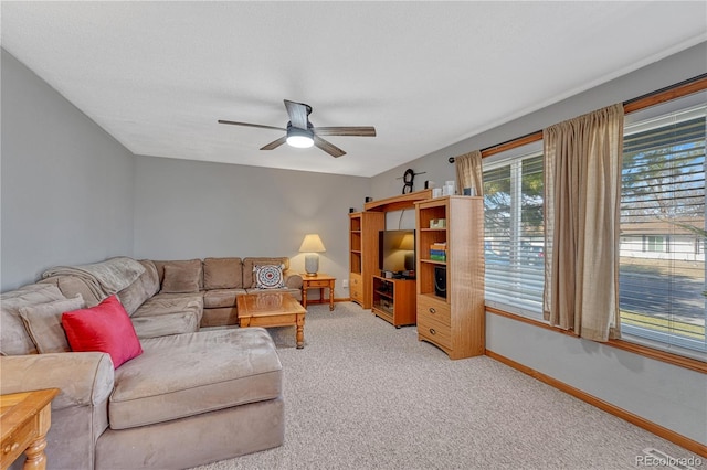 1786 Wintergreen Pl, Loveland, CO 80537 - carpeted living room featuring ceiling fan and baseboards