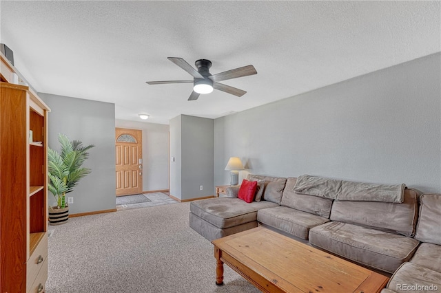 1786 Wintergreen Pl, Loveland, CO 80537 - carpeted living room featuring ceiling fan, baseboards, and a textured ceiling