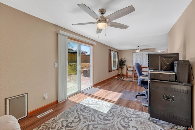 1786 Wintergreen Pl, Loveland, CO 80537 - office with wood finished floors, visible vents, and baseboards