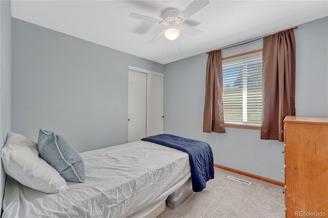 1786 Wintergreen Pl, Loveland, CO 80537 - carpeted bedroom with baseboards, visible vents, ceiling fan, and a closet