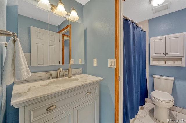 1786 Wintergreen Pl, Loveland, CO 80537 - bathroom with toilet, marble finish floor, visible vents, and vanity