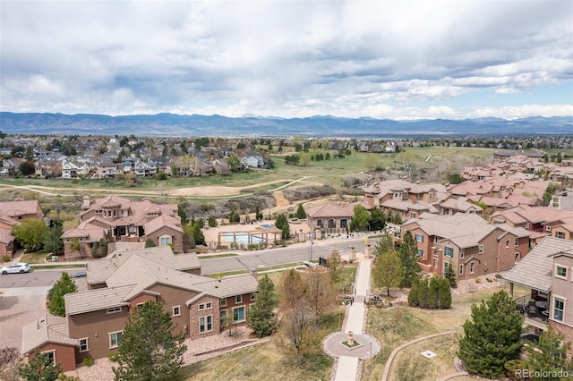 aerial view of residential area with a mountain backdrop